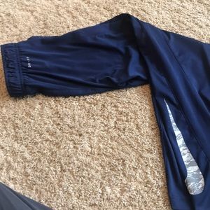 Boys Nike dri-fit navy pants.